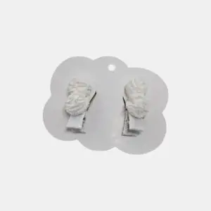 PRESILHA DOIS POMPOMS